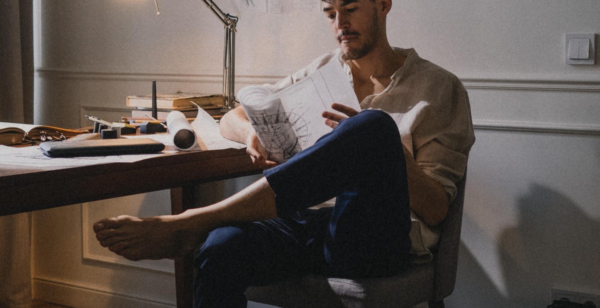 bookshelf, reading chair, lamp