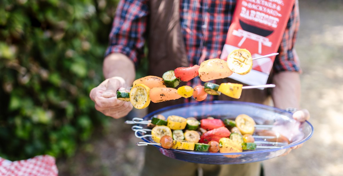 grill basket or skewers with vegetables inside