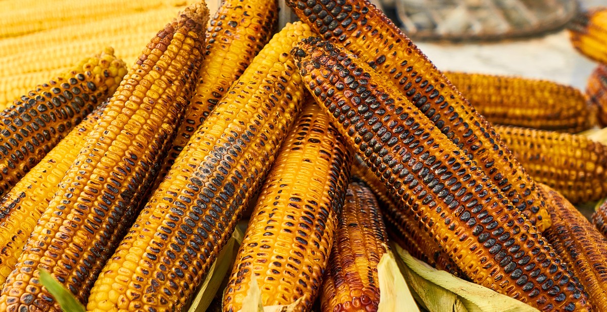 grilled corn with toppings