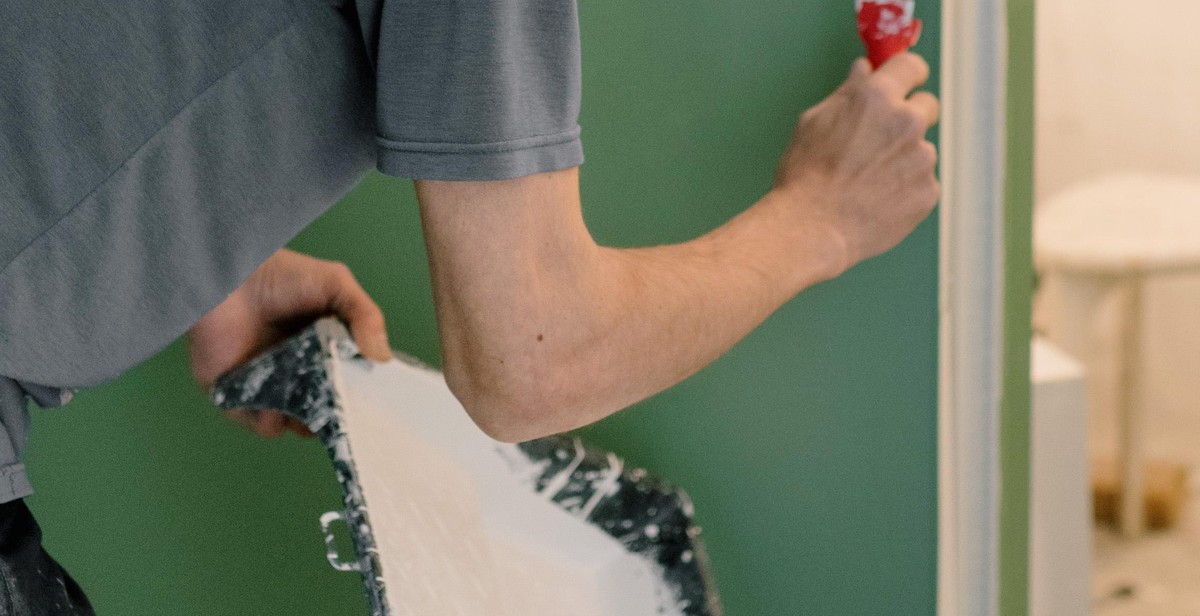 Painting the Boards for a DIY Mason Jar Wall Organizer