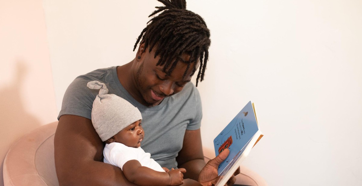 Parent reading bedtime story to child