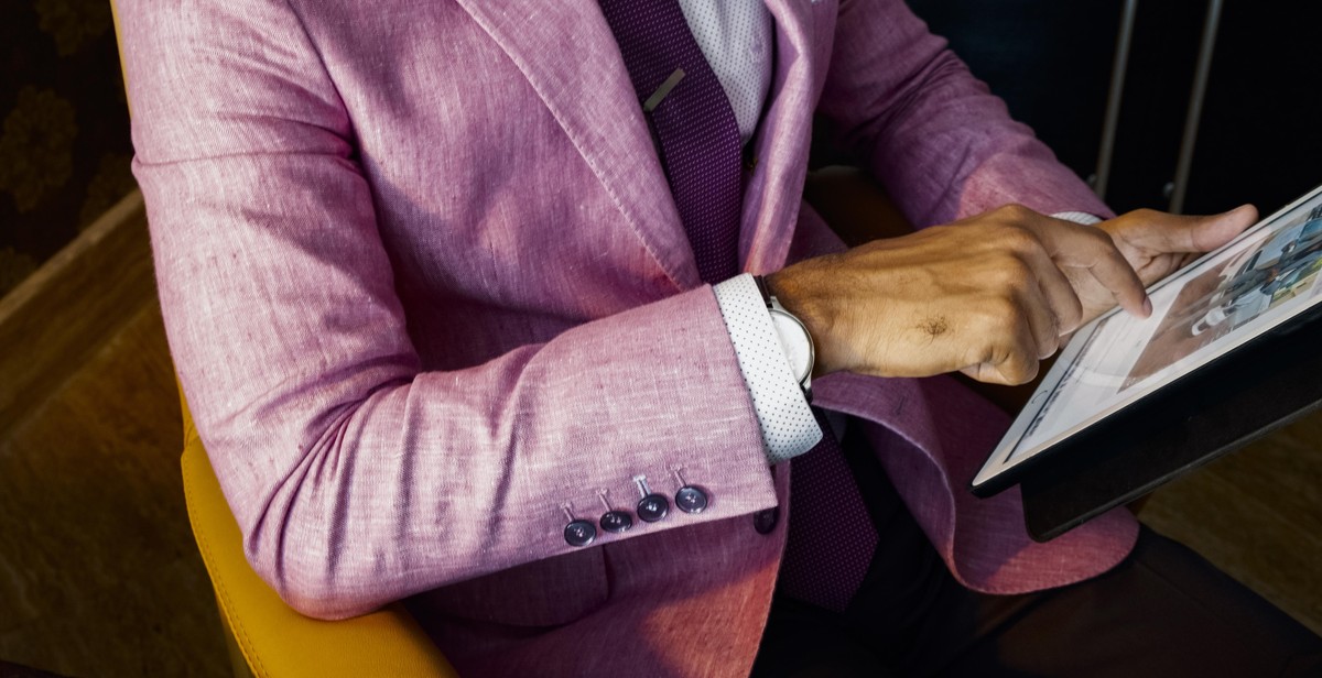 poker player looking at their watch