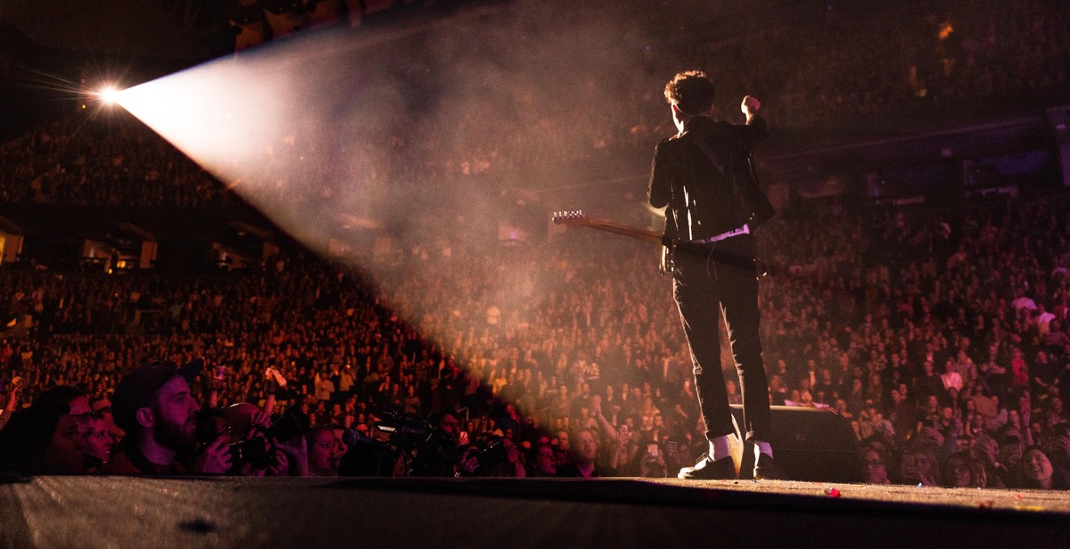 singer connecting with audience on stage