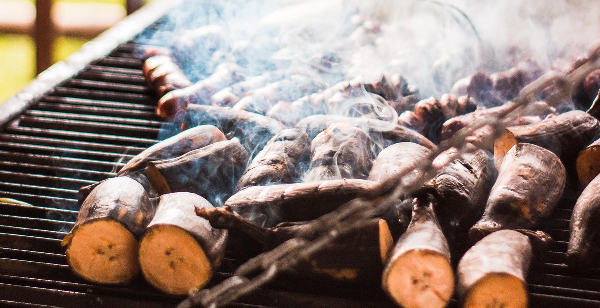 smoking ribs on a charcoal grill