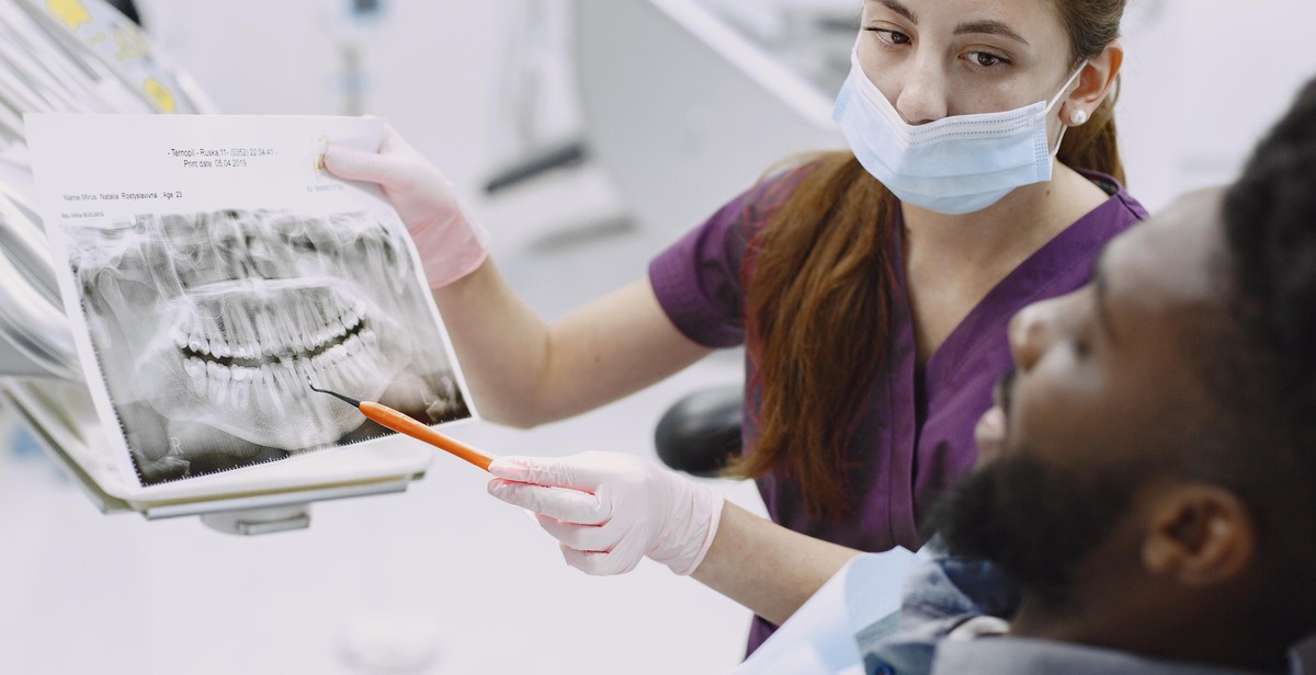 patient preparing for dental x-ray