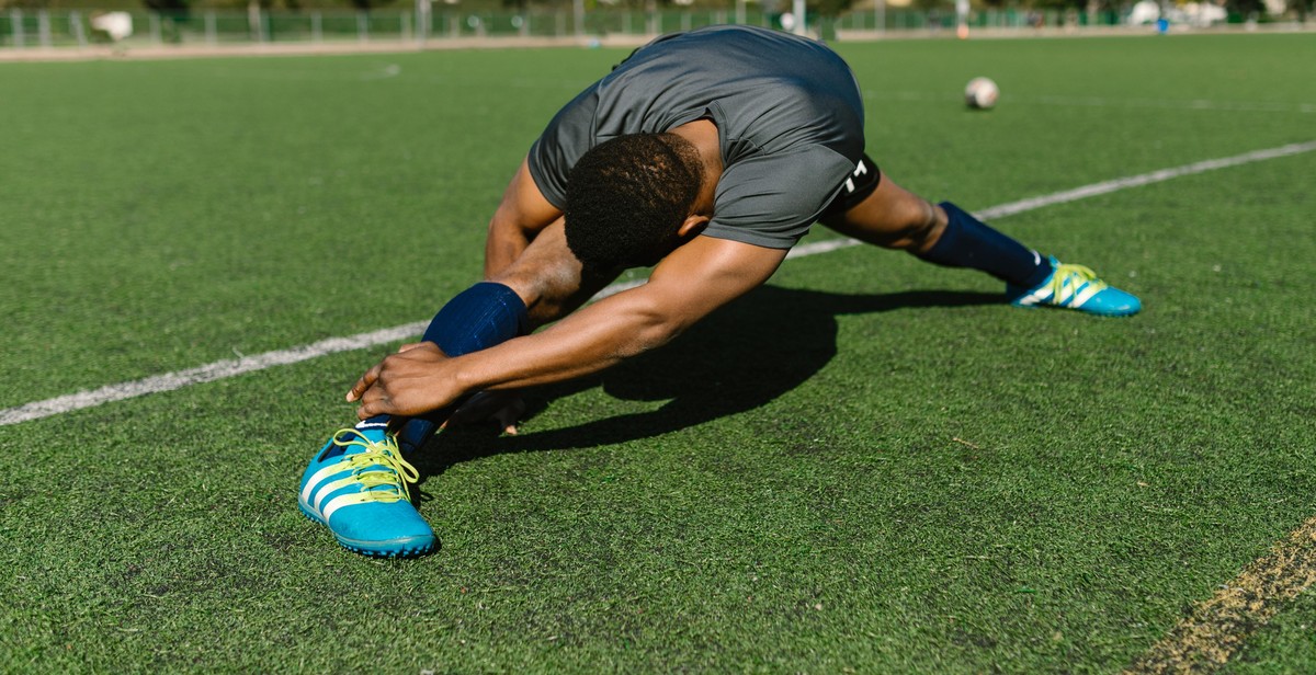 soccer players warming up or doing exercises